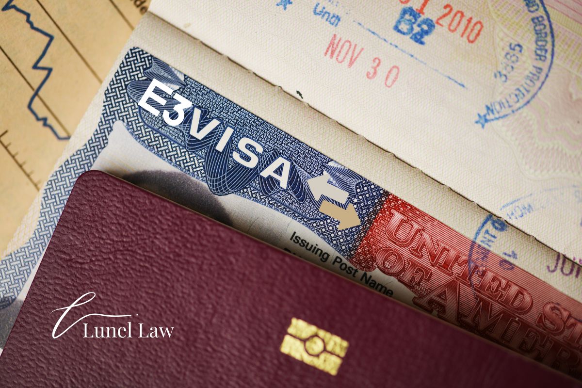 Australian professional reviewing E-3 visa transfer application with employer